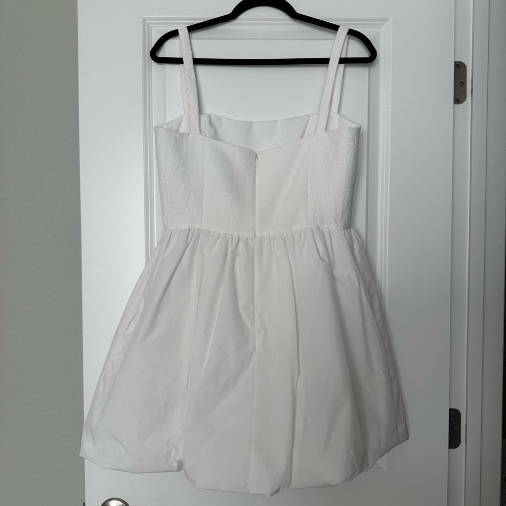 White mini dress, bubble skirt

Christine Bouclé Bubble Minidress